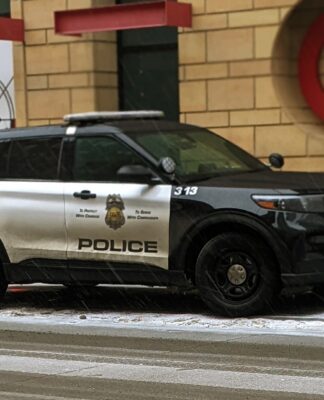 Minneapolis Police Department squad car in front of downtown Target