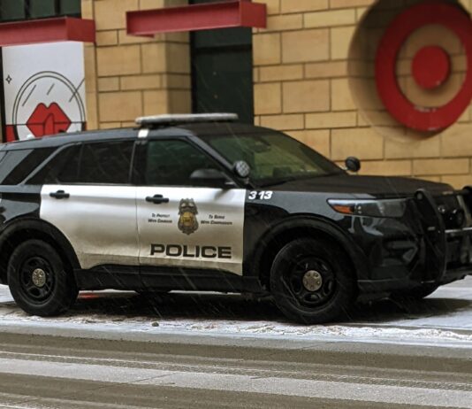 Minneapolis Police Department squad car in front of downtown Target